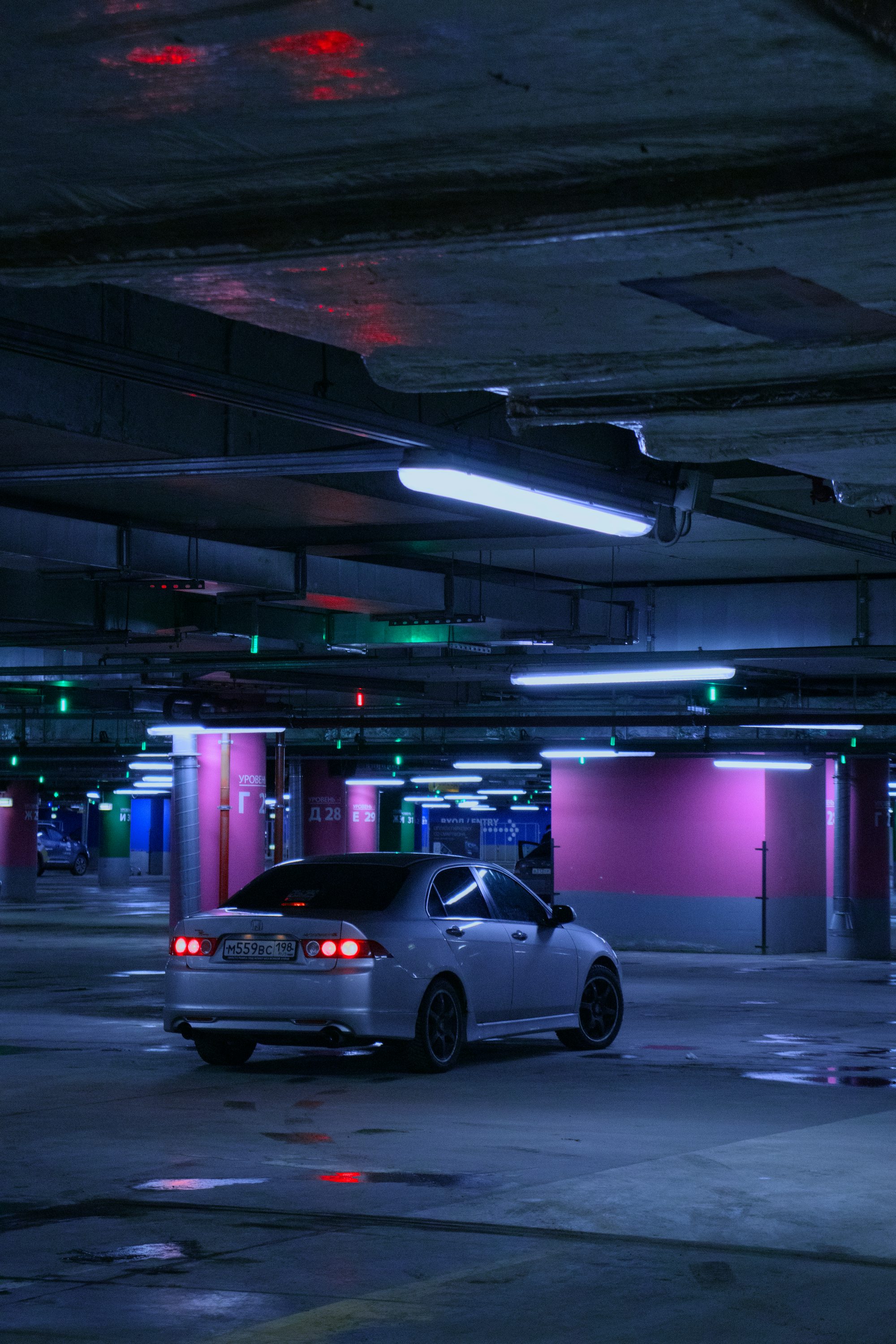 a car is parked in a parking garage