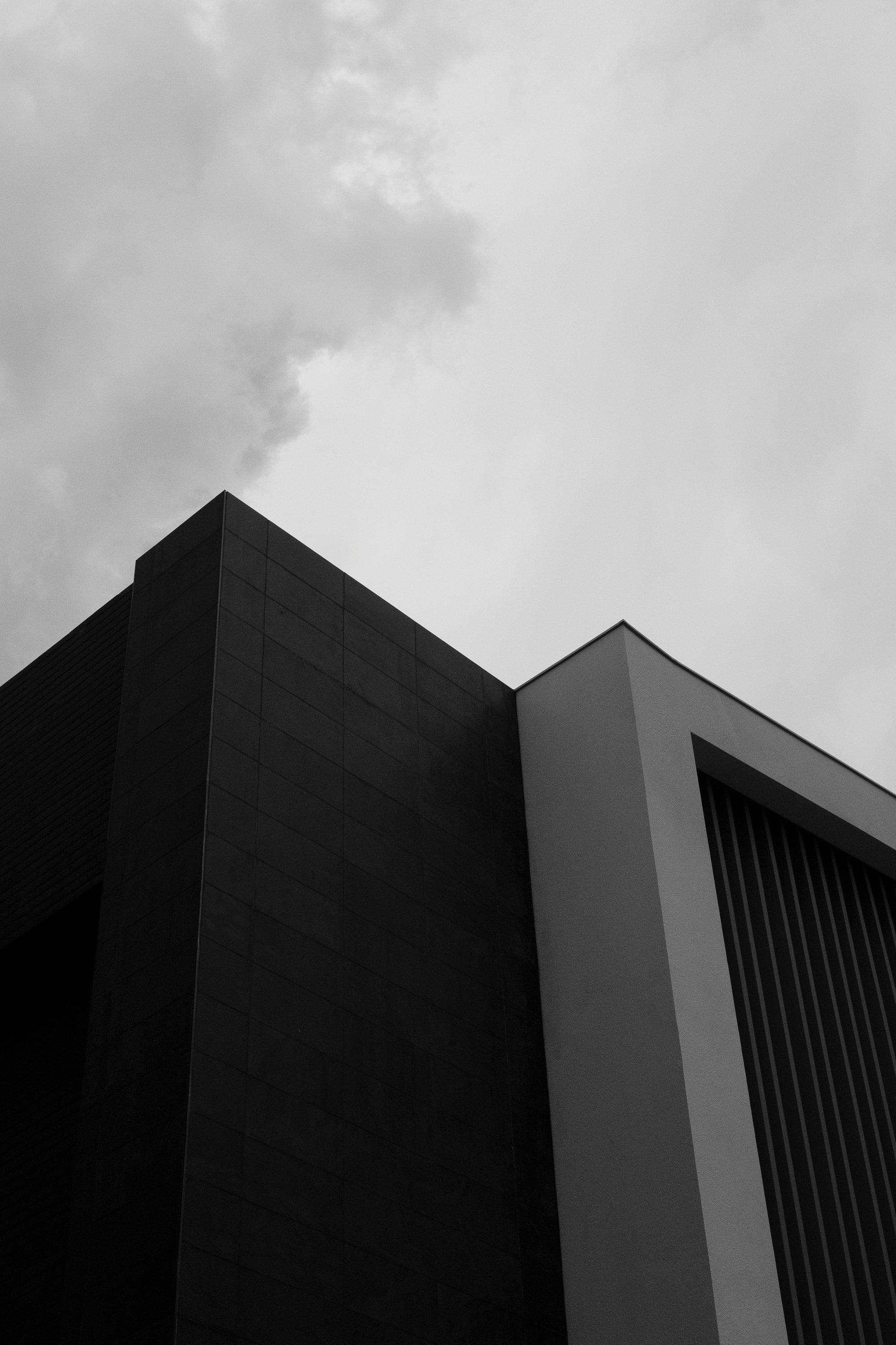 A black and white photo of a tall building